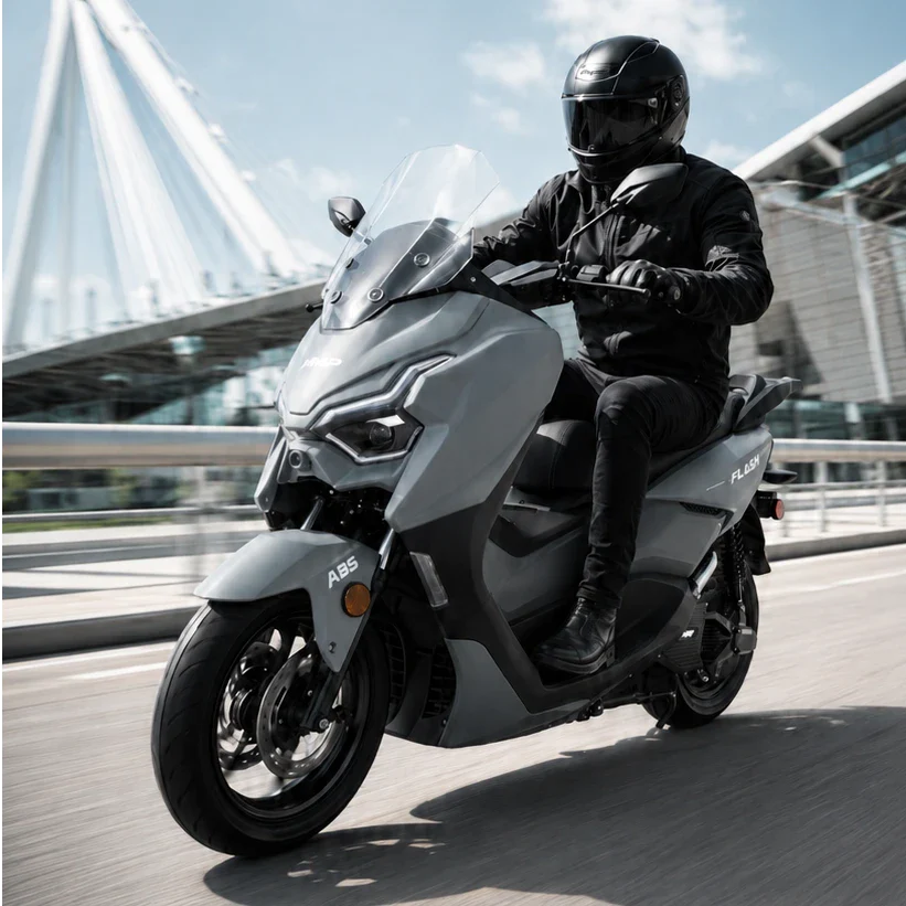 HMP FLASH electric scooter with rider wearing black helmet riding on modern city bridge, high performance electric moped style scooter in urban commuting environment, motion blur, premium commercial photography.