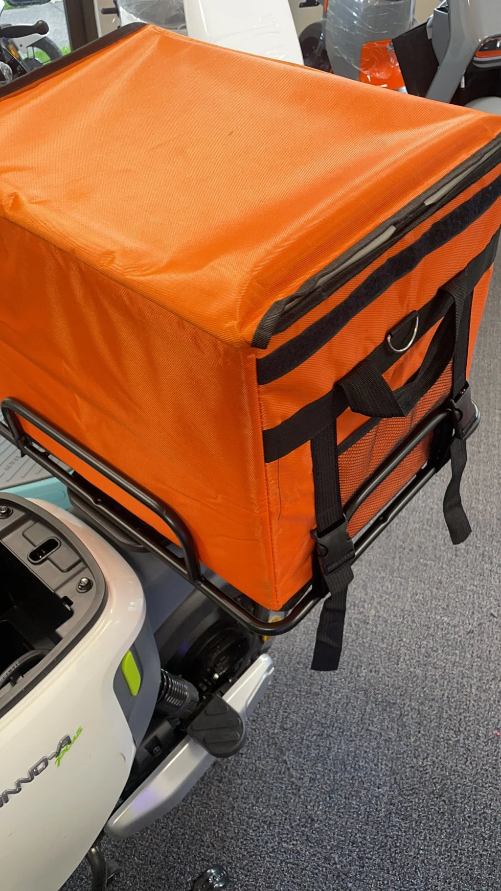 Close-up of Orange Takeaway Bag Installed on INNO E-bike